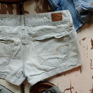 American Eagle Light Wash & Holes Cheeky Shorts